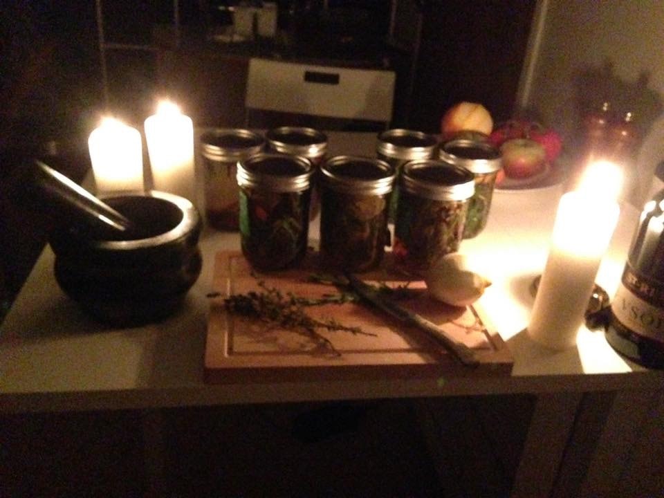 Apologies for the poor quality! The candles were not only cool and ambient, but also necessary due to a power outage at the time. These are the jars of my various concoctions, including perfumes and mouth rinses.